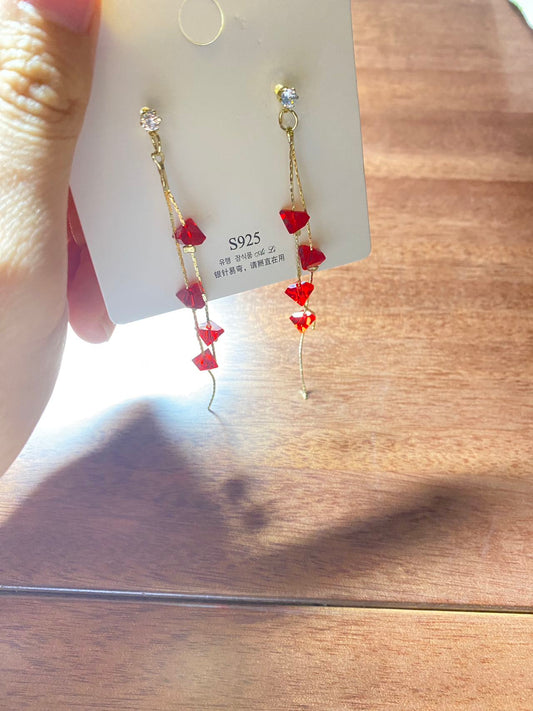 Red fringed earrings
