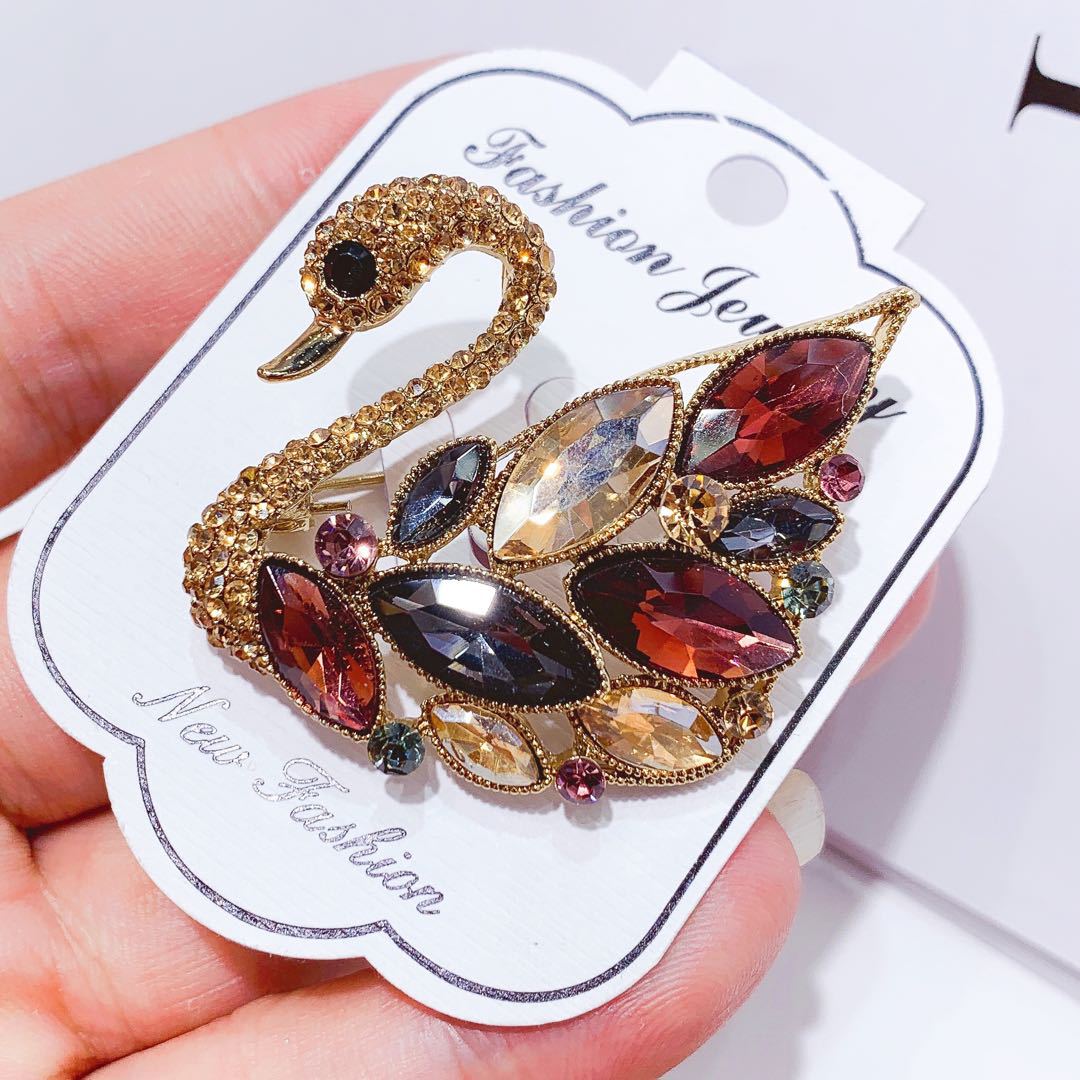 Rhinestone swan brooch