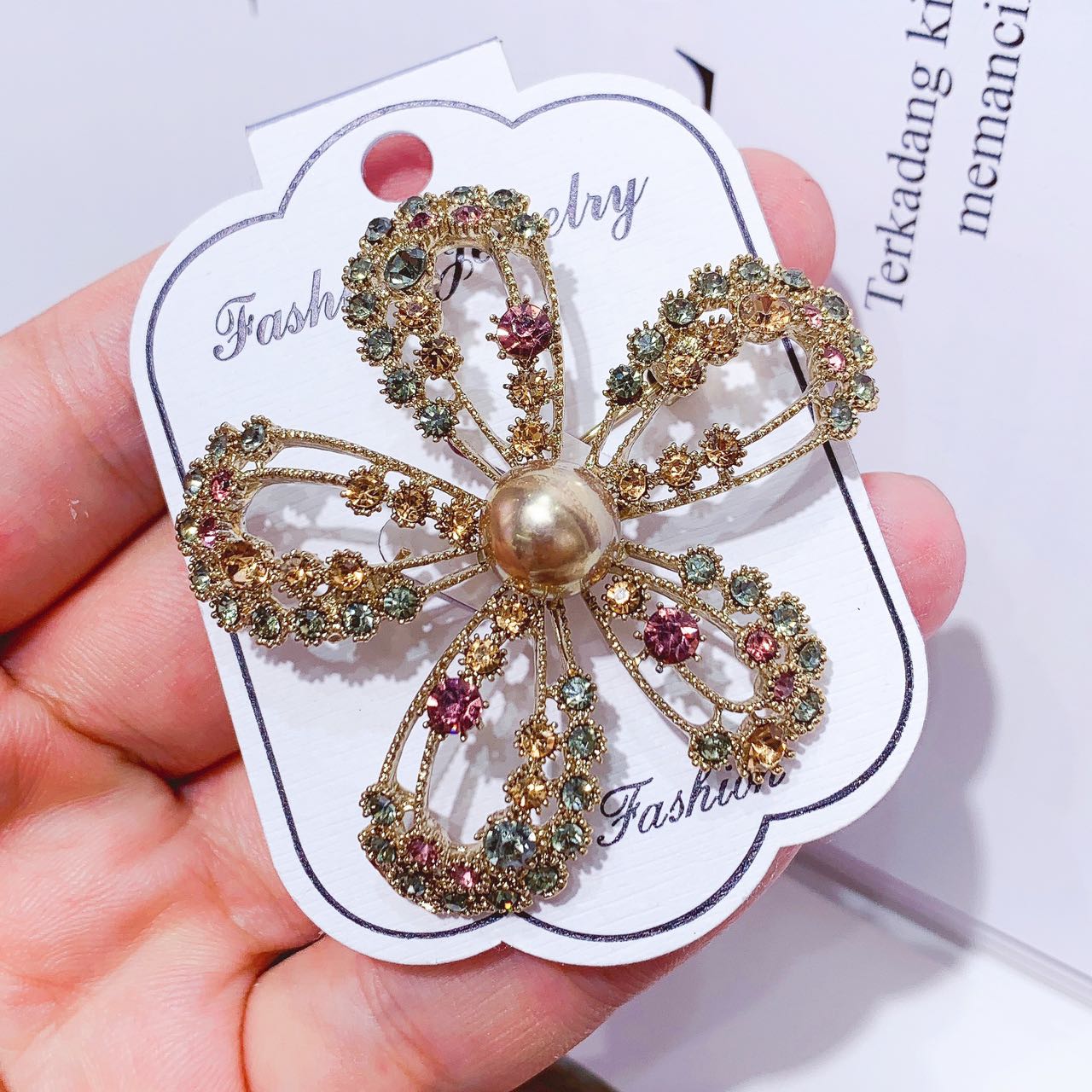 Rhinestone flower brooch