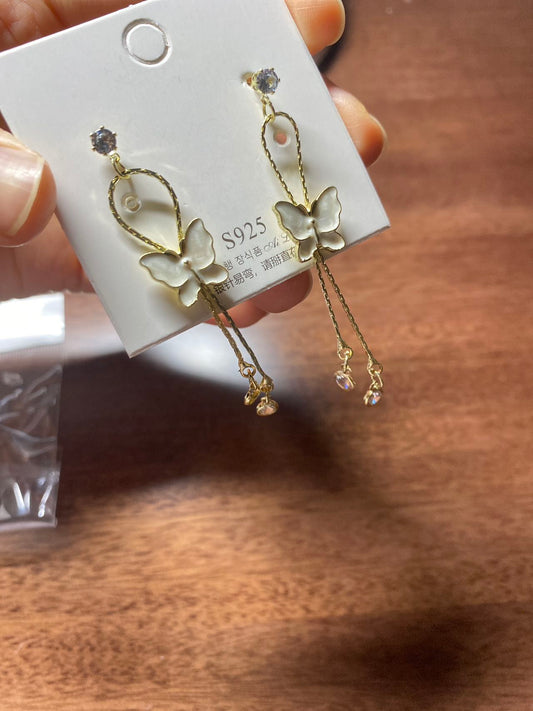 Butterfly fringed earrings