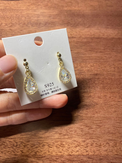 Double-sided teardrop earrings