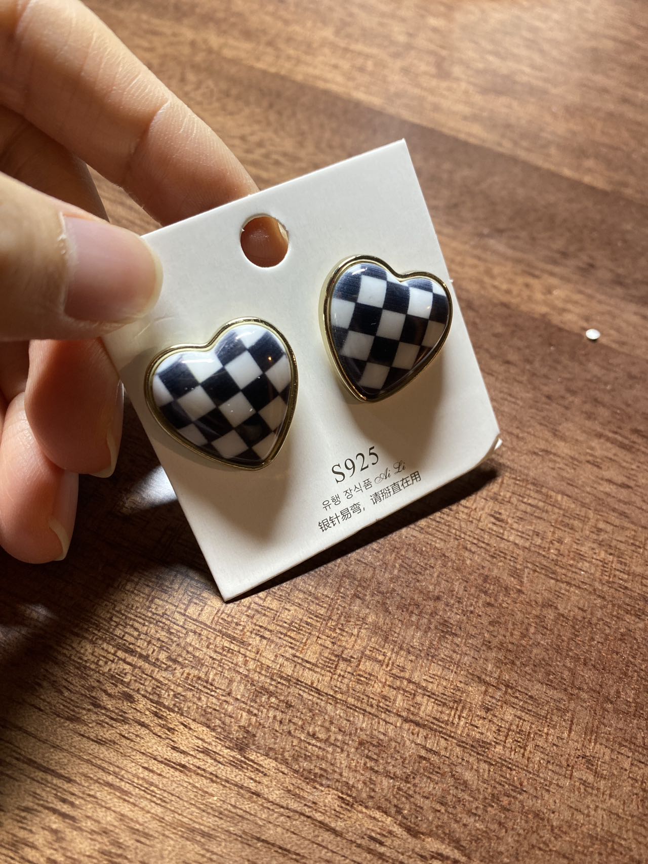 Black and white heart-shaped earrings