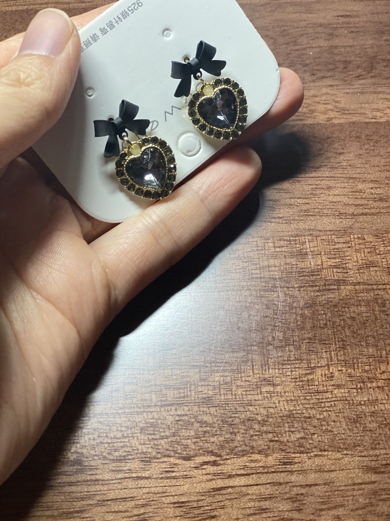 Black heart-shaped earrings