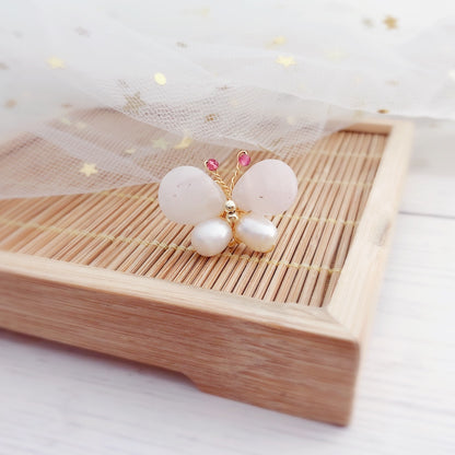 Pink butterfly pearl stud earrings