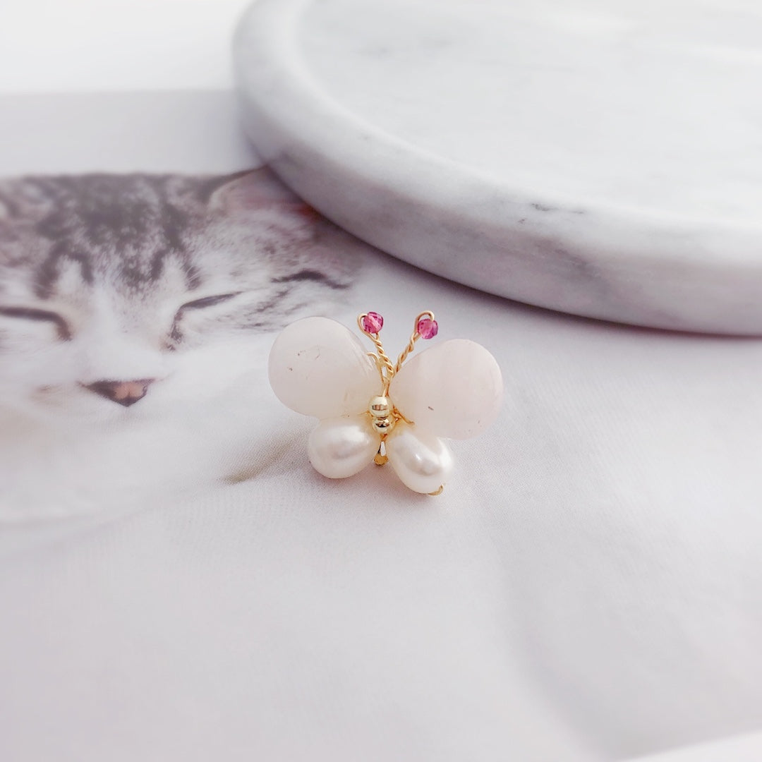 Pink butterfly pearl stud earrings