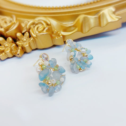 Glacier blue pearl stud earrings